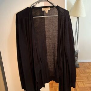 Black sweater, great fabric!  Add a layer of warmth and enhanced style!